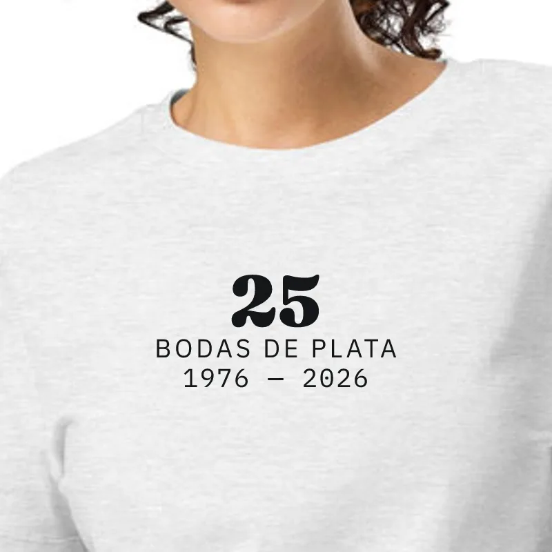Dona amb samarreta gris jaspiat, enquadrament al segell: 25 · NOCES DE PLATA