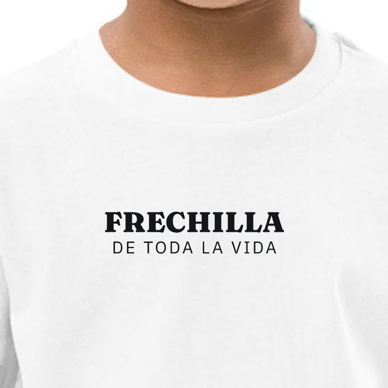 Nen amb samarreta blanca, enquadrament al segell: FRECHILLA · DE TOTA LA VIDA