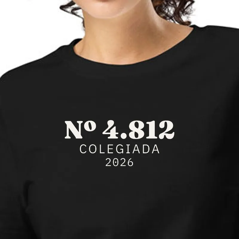 Dona amb samarreta negra, enquadrament al segell: NÚM. 4.812 · COL·LEGIADA